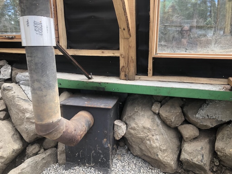 Wood stove in greenhouse